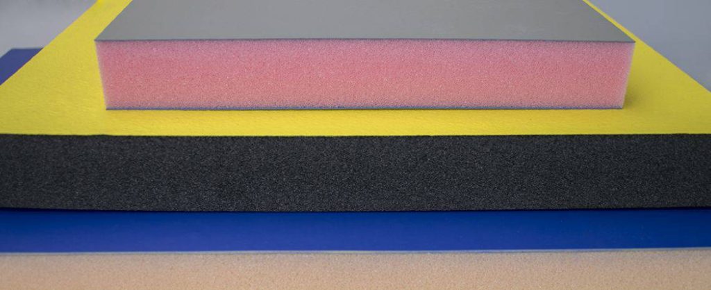 Sfeerbeeld van verschillende coatings van IFG, om de bezoeker een beter beeld te geven hoe een zachte coating eruit ziet.